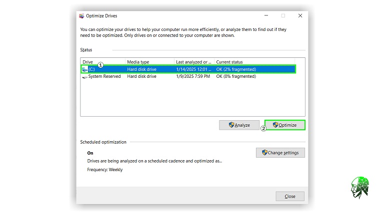 Windows Optimize Drives window showing two drives, one system reserved, and one hard disk drive, with their last analysis dates and fragmentation status.